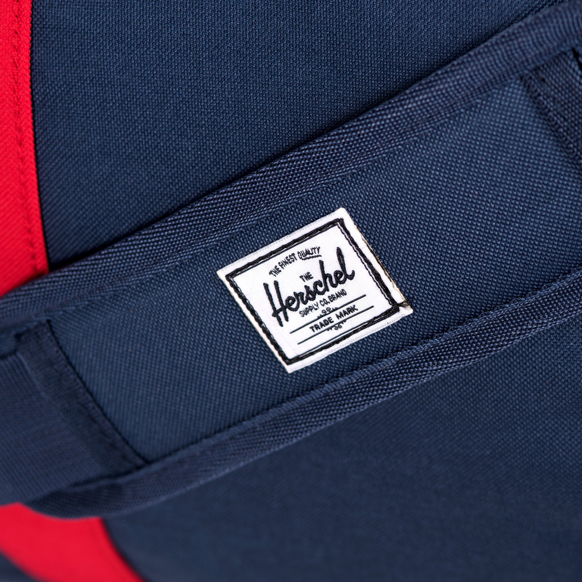 Herschel Supply Novel Duffel Bag - Woodland Camo / Navy / Red