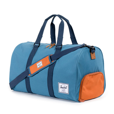 Herschel Supply Novel Duffel Bag - Cadet Blue, Carrot & Navy
